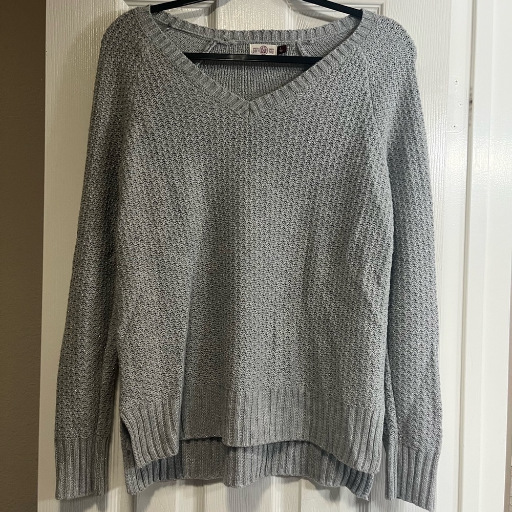 $5 SALE Juniors large gray sparkle sweater. GUC. V-neck. Slits on the sides.